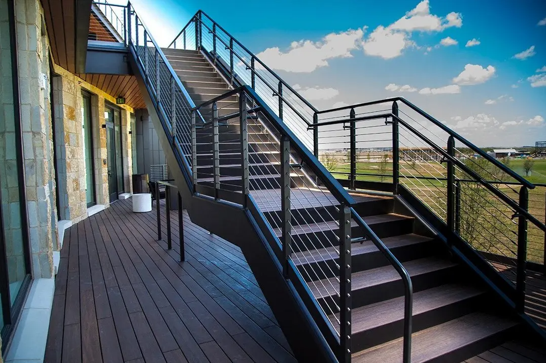 Architectural metal railings and stairs on a commercial exterior deck