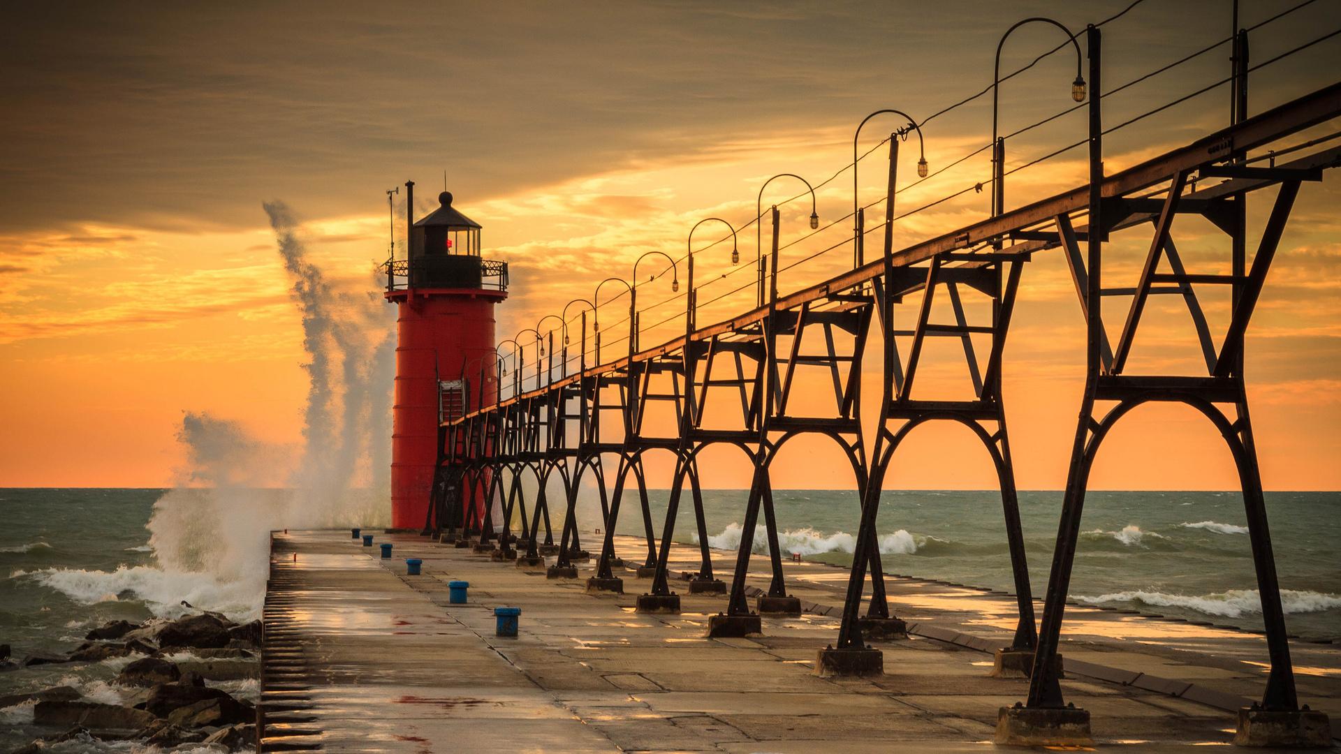 Grand Haven Pier Catwalk restoration metalwork at sunset